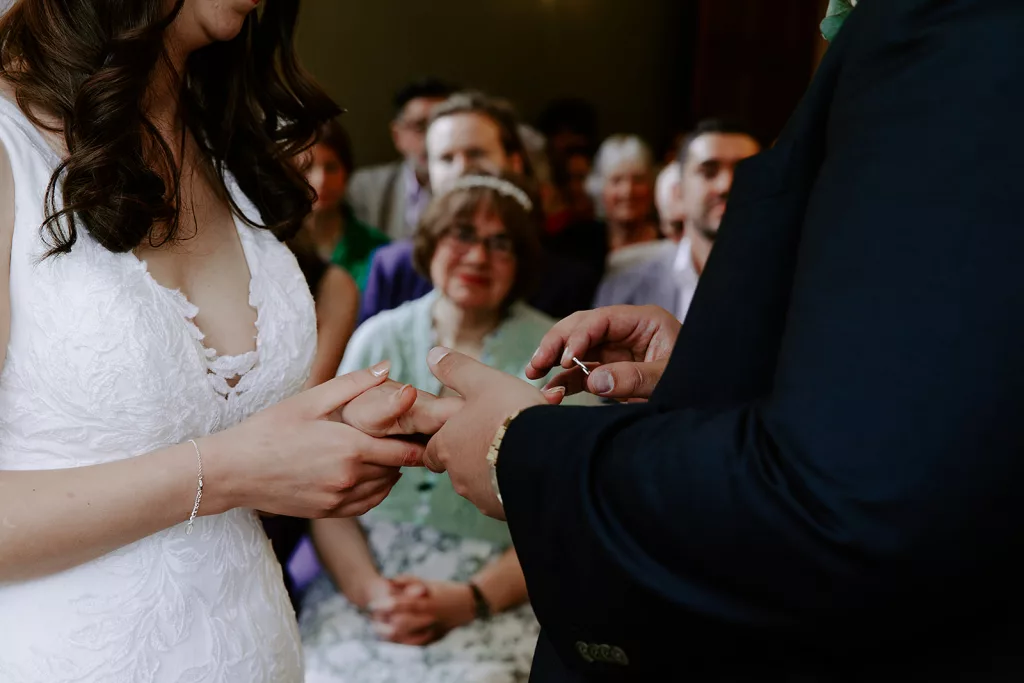Jake and Anna exchanging personalised vows during their Somerset wedding ceremony